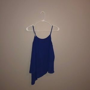 A blue ruffled tank top